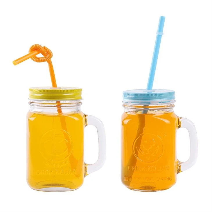 Empty mason jars with lids and straws